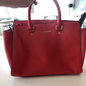 Red Michael Kors bag